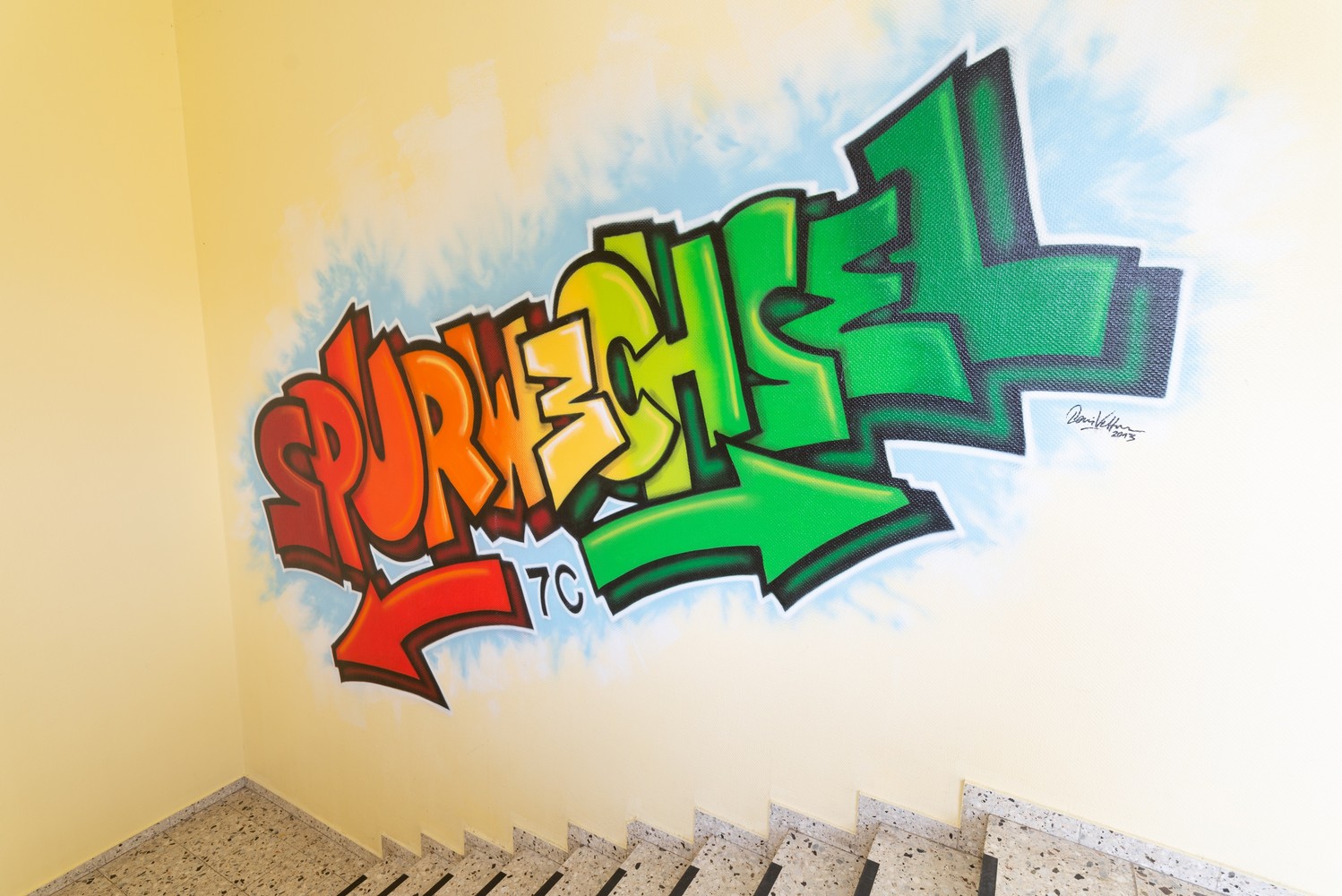 Das Bild zeigt ein buntes Graffiti, mit dem Wort Spurwechsel